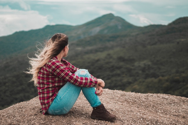 Woman staring contemplatively into the distance